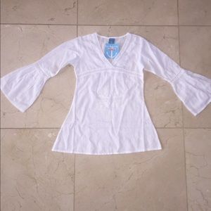 Four years old white blouse from Le Soleil Miami